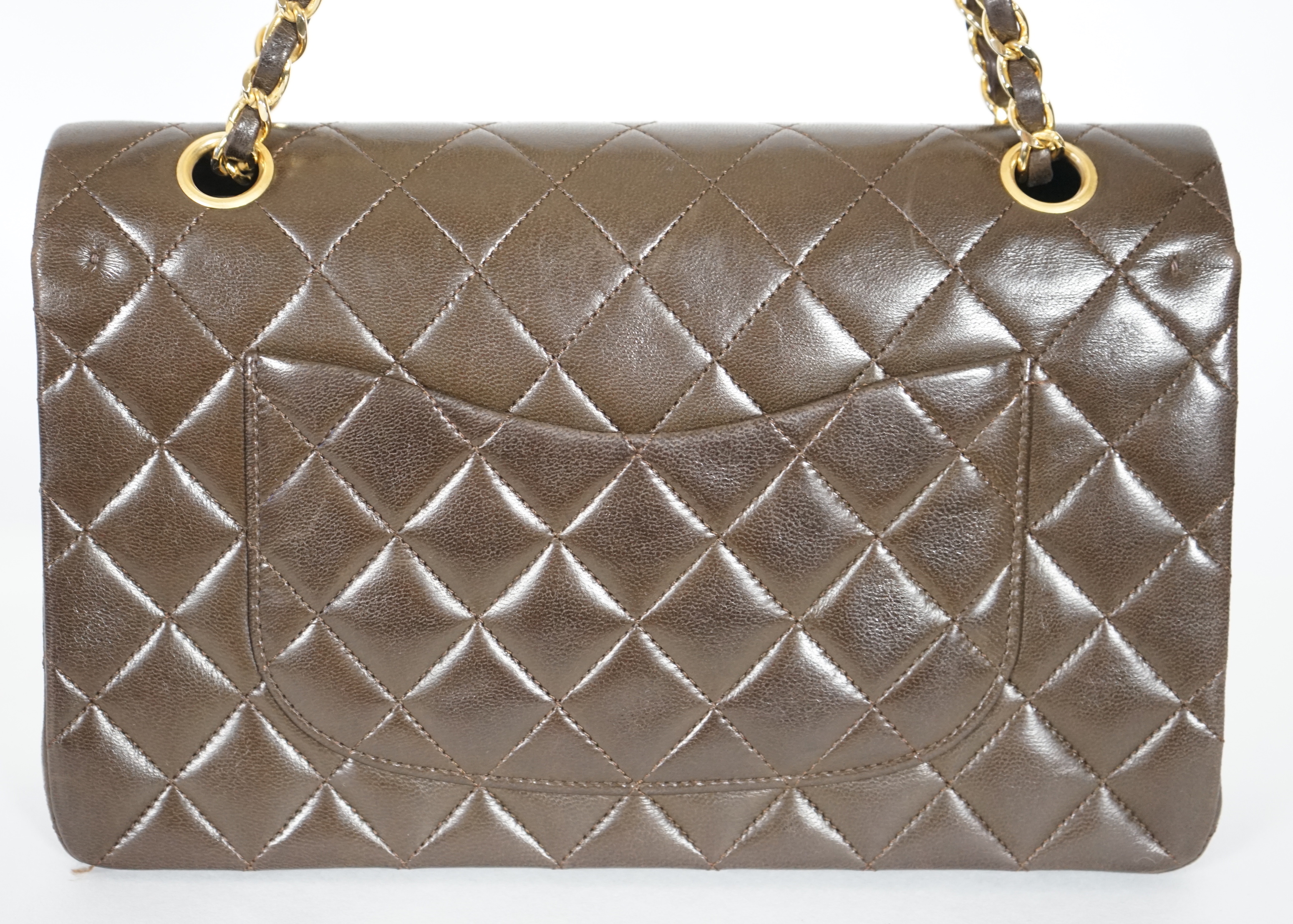 A Chanel brown quilted lambskin medium Classic Double Flap bag, width 25.5cm, height 15.5cm, depth 7cm